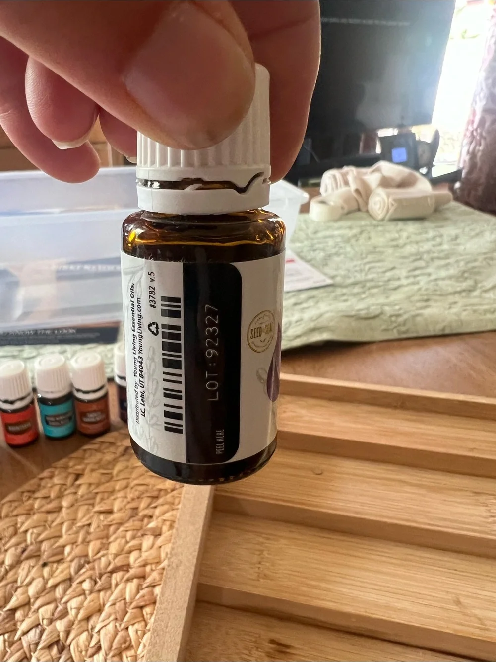 Young Living Dry Skin Serum in White and Amber Bottle